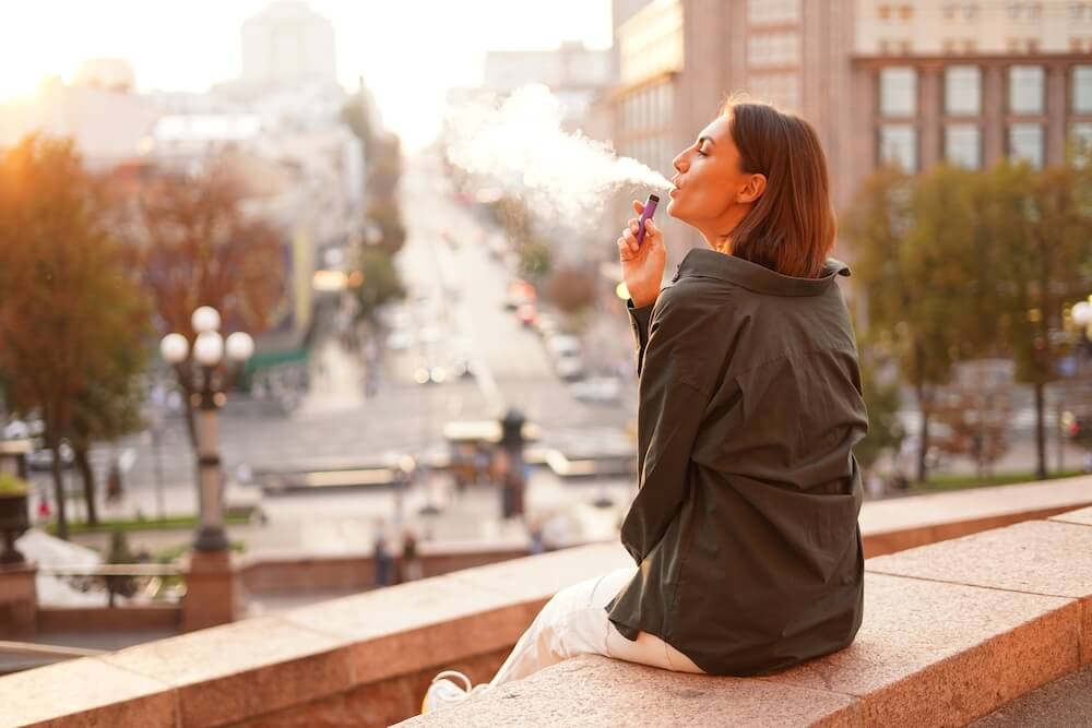 Can You Smoke or Vape with Invisalign? Risks & Care Advice